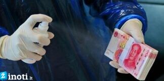 PSO paskelbė, jog galima užsikrėsti koronavirusu per pinigus ir korteles
