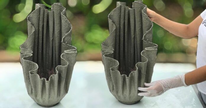 Šiam įspūdingam vazonui pagaminti tereikia cemento ir seno rankšluosčio!